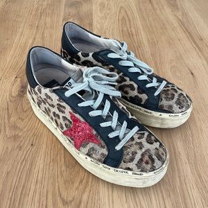 Golden Goose Hi Star low top sneakers. Snow leopard print with red glitter star